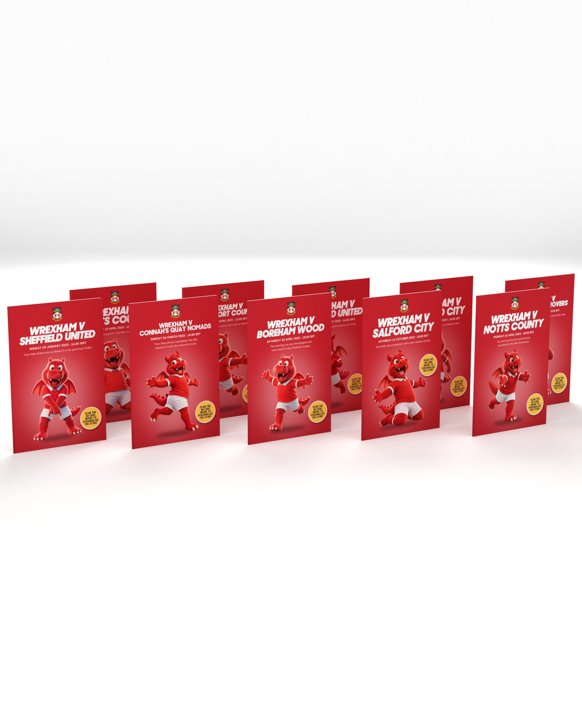 Ten Wrexham Historic Moments books standing in a row on a white studio background, Quick buy edition with Wrex the Dragon.